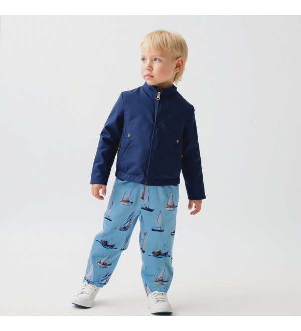 T-VELOS : Pantalon bleu imperméable avec doublure en polaire et imprimé de voiliers.